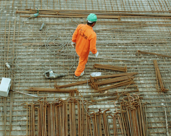 Miner working with scaffolding